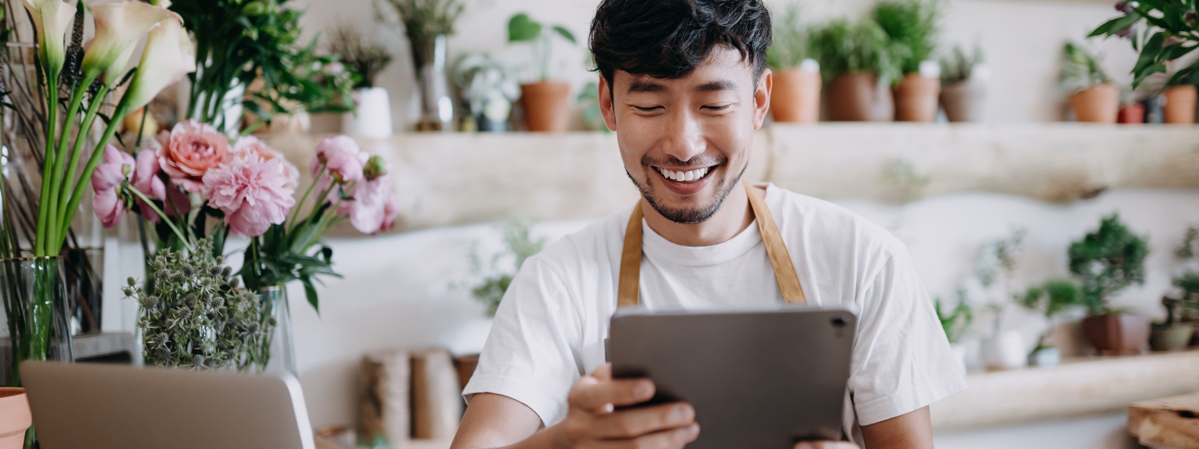 a man working on his tablet for his business