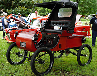Photo of a carriage from a car show at the Summerfest event.